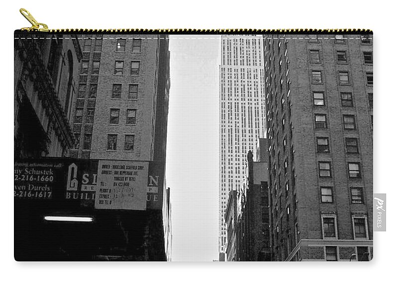 Black And White Zip Pouch featuring the photograph The City that never sleeps by Elisabeth Derichs