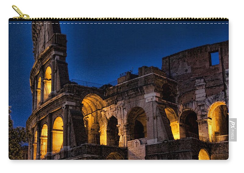 Coleseum Zip Pouch featuring the photograph The Coleseum in Rome at night by David Smith