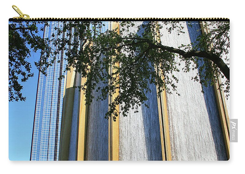 Houston Zip Pouch featuring the photograph The Houston Water Wall and Williams Tower by Angela Rath