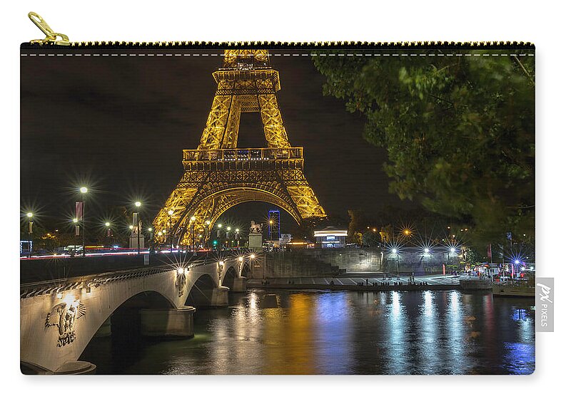 Eiffel Zip Pouch featuring the photograph The Lights of Paris by Everet Regal