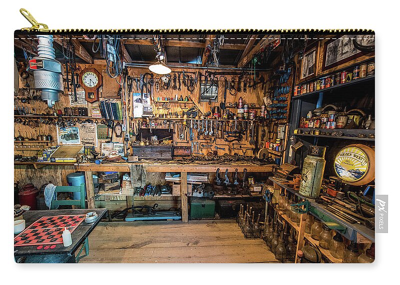 The Mechanics Workshop Zip Pouch featuring the photograph The Mechanics Workshop by Paul Freidlund