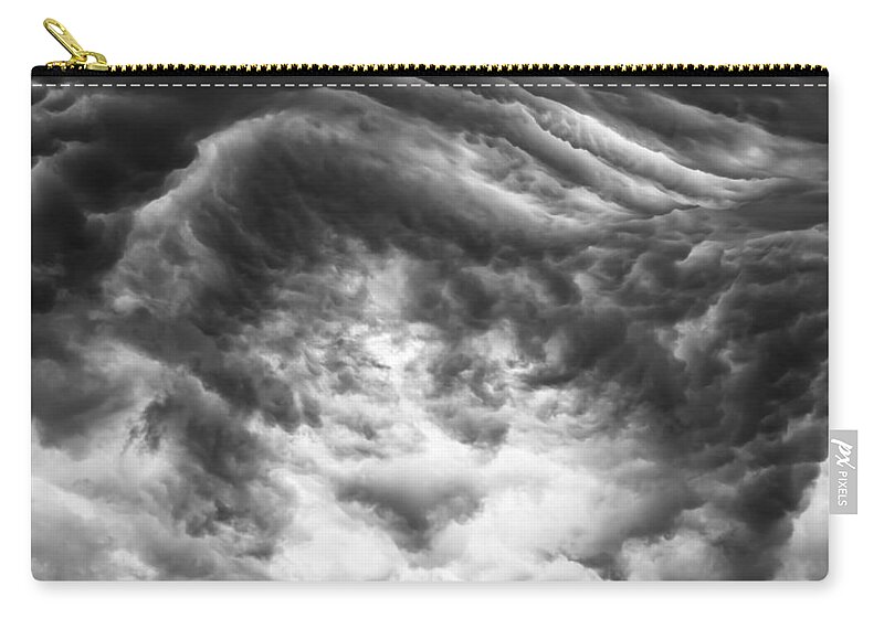 Storm Clouds Zip Pouch featuring the photograph The push back by Charles McCleanon