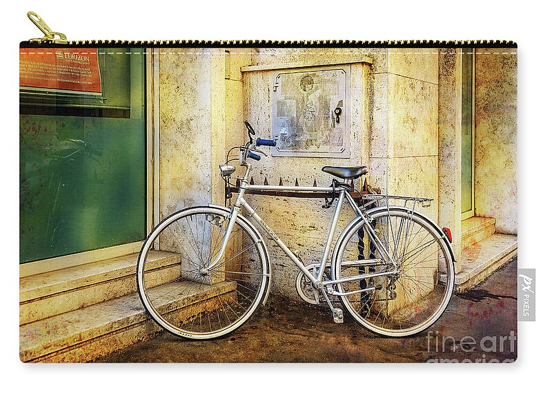 Elite Zip Pouch featuring the photograph The Shinning Elite Bicycle by Craig J Satterlee