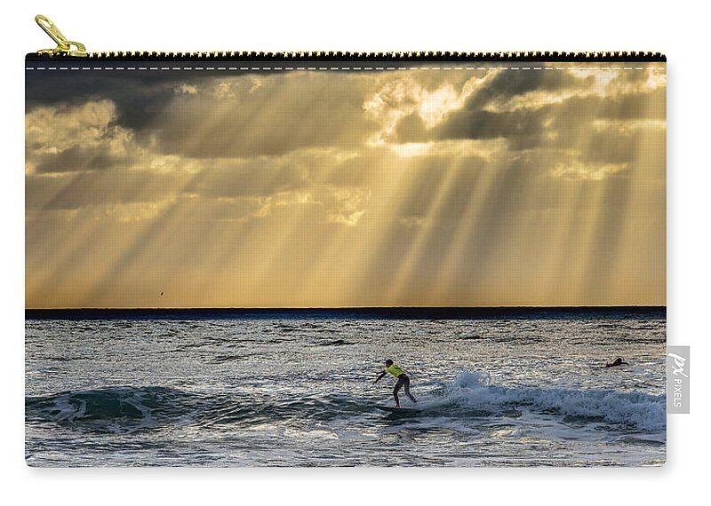 Action Zip Pouch featuring the photograph The Silver Surfer by Peter Tellone