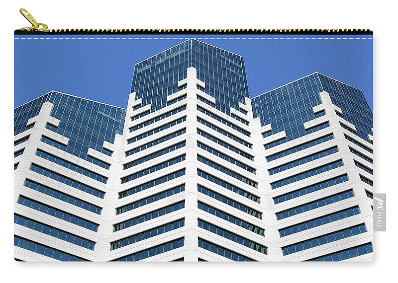 Buildings Zip Pouch featuring the photograph Three Towers by Ramunas Bruzas