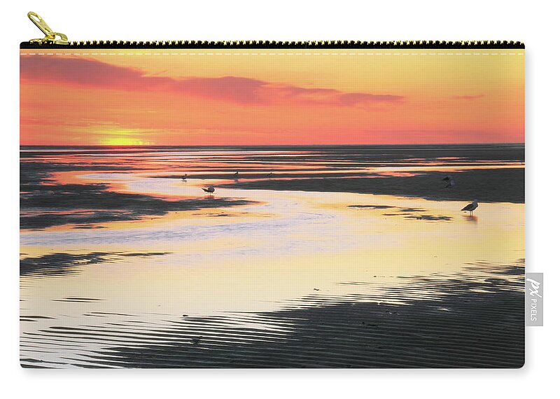 Sunset Zip Pouch featuring the photograph Tidal Flats at sunset by Roupen Baker