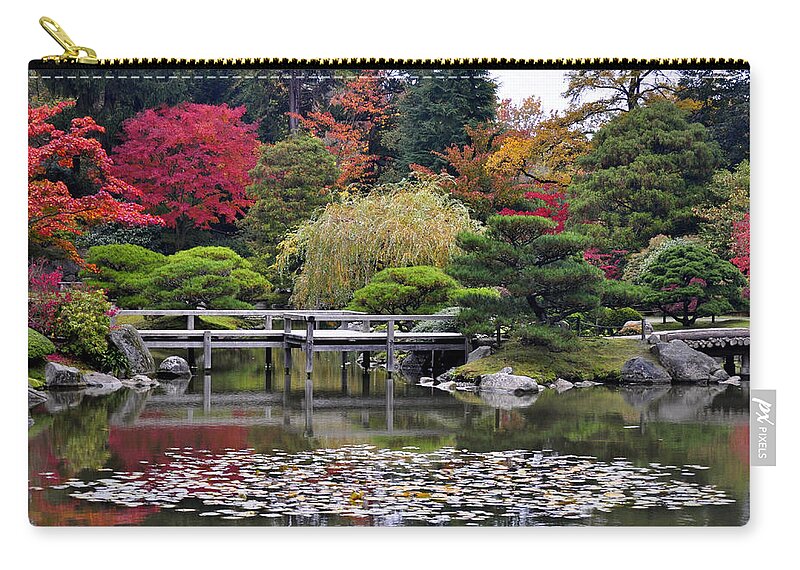 Landscape Zip Pouch featuring the photograph Tranquil Autumn by Emerita Wheeling