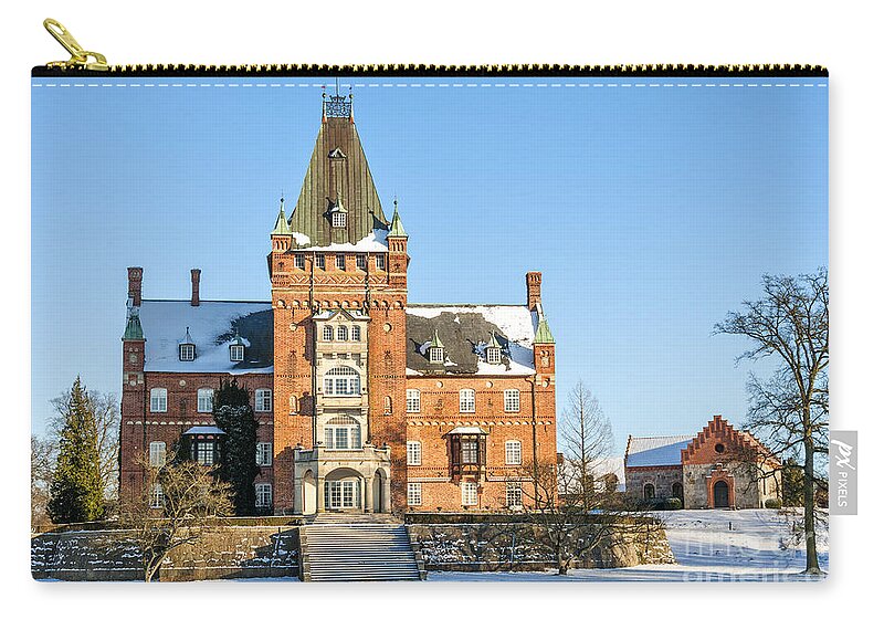 Trollenas Zip Pouch featuring the photograph Trollenas Castle in Winter by Antony McAulay