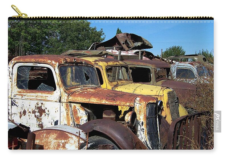 Used Trucks Zip Pouch featuring the photograph Trucks by Charles Robinson