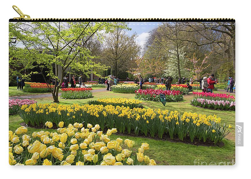 Tulips Zip Pouch featuring the photograph Tulips and other spring bulbs at Keukenhof Gardens Holland by Louise Heusinkveld