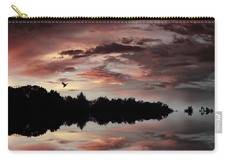 Sunset Zip Pouch featuring the photograph Twilight Flight by Jessica Jenney