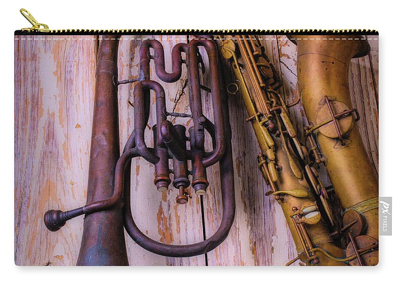 Color Zip Pouch featuring the photograph Two Horns by Garry Gay