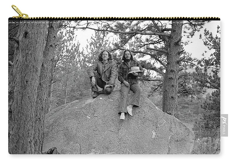 American West Zip Pouch featuring the photograph Two Men on a Boulder in the American West, 1972 by Jeremy Butler
