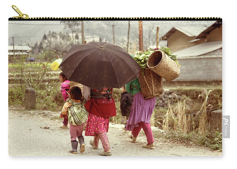 Vietnam Zip Pouch featuring the photograph Umbrella Children Vietnamese by Chuck Kuhn