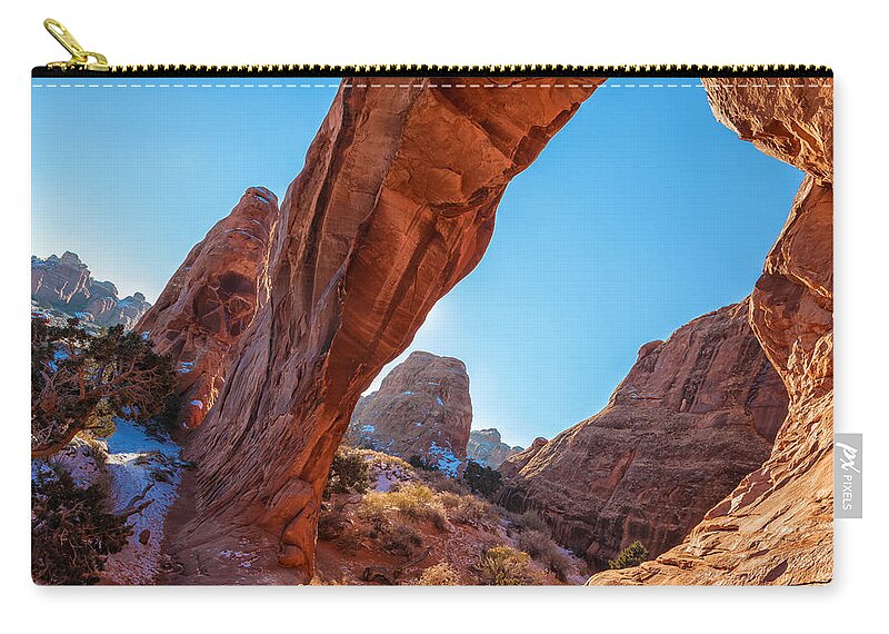 Landscape Zip Pouch featuring the photograph Under The Arch Rock by Jonathan Nguyen