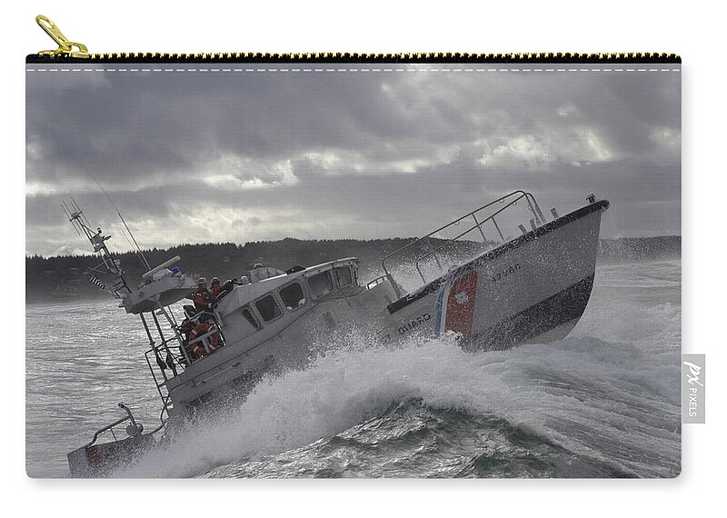 Horizontal Zip Pouch featuring the photograph U.s. Coast Guard Motor Life Boat Brakes by Stocktrek Images