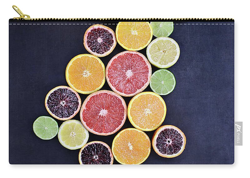 Citrus Zip Pouch featuring the photograph Variety of Citrus Fruits by Stephanie Frey