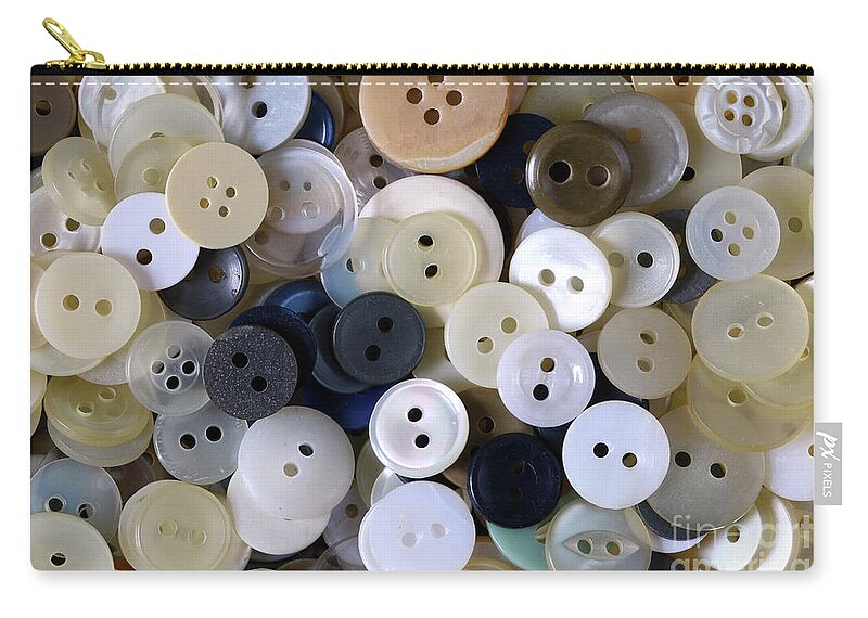 Button Zip Pouch featuring the photograph Various clothing buttons by Michal Boubin
