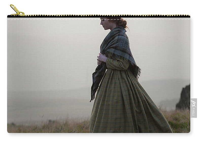 Victorian Zip Pouch featuring the photograph Victorian Woman On The Moors In Winter by Lee Avison