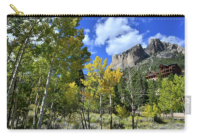 Humboldt-toiyabe National Forest Zip Pouch featuring the photograph Village Beneath Mt. Charleston by Ray Mathis
