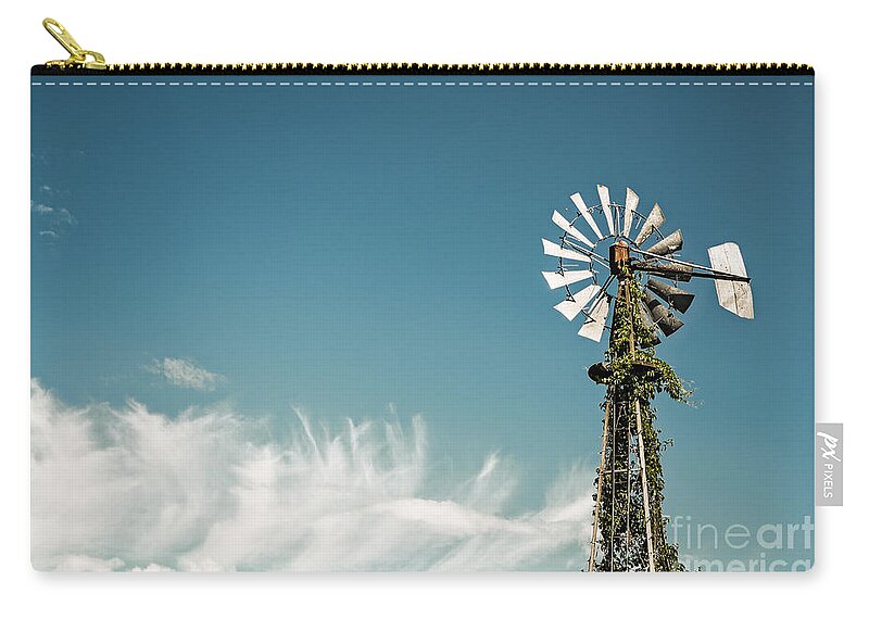 Canada Zip Pouch featuring the photograph Vines Growing Up a Windmill in Canada by Bryan Mullennix
