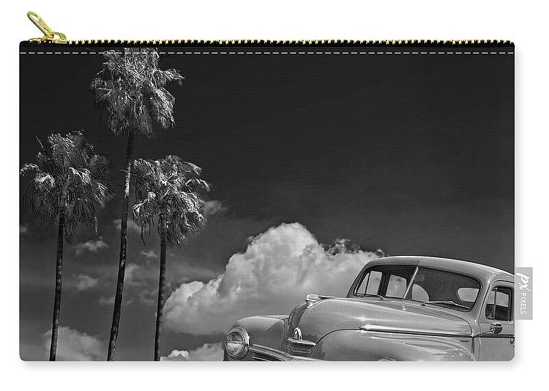 Car Zip Pouch featuring the photograph Vintage Plymouth Automobile in Black and White against Palm Trees by Randall Nyhof