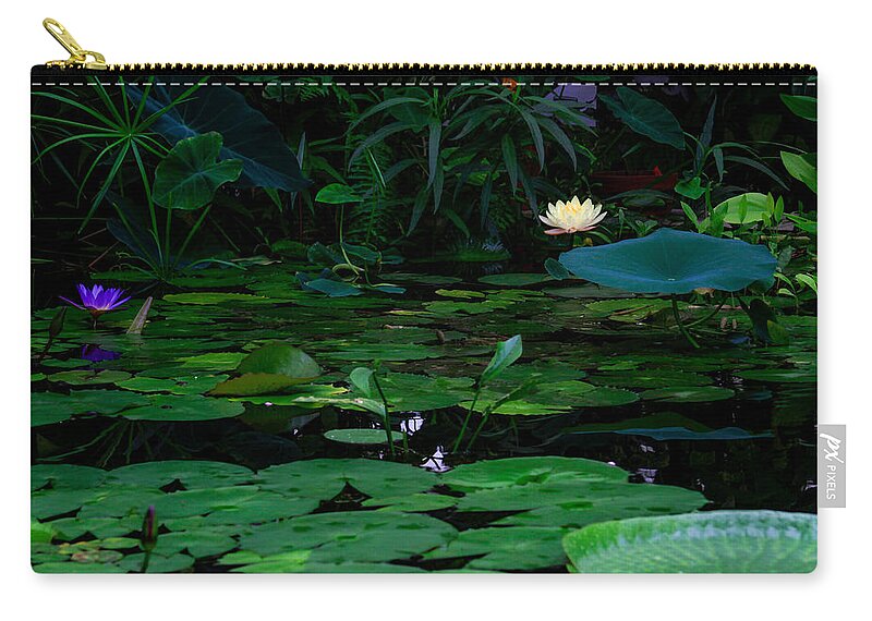 Bonnie Follett Zip Pouch featuring the photograph Water Lilies in the Pond by Bonnie Follett