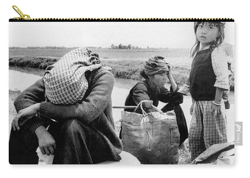 1970s Zip Pouch featuring the photograph Weary Vietnamese Refugees by Underwood Archives