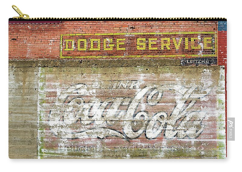 Red Lodge Zip Pouch featuring the photograph Weathered Brick Wall in Red Lodge, Montana by Jess Kraft