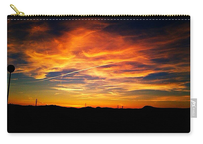 Beautiful Zip Pouch featuring the photograph West side of a Sunset I by Nieve Andrea