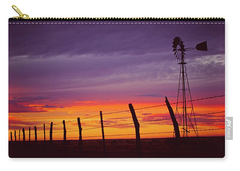 West Texas Zip Pouch featuring the photograph West Texas Sunset by Adam Reinhart