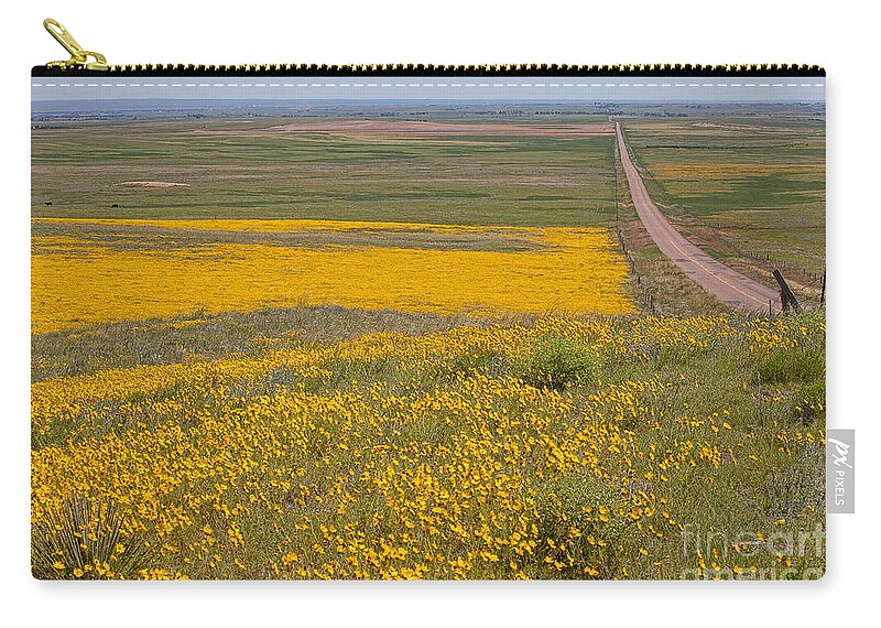 Yellow Wildflowers Zip Pouch featuring the photograph What Lies Ahead by Jim Garrison
