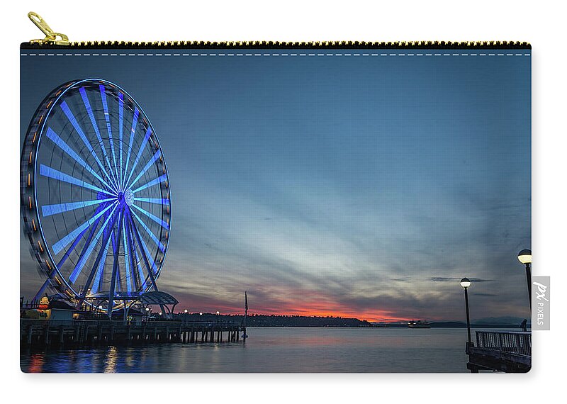 Usa Zip Pouch featuring the photograph Wheel on the Pier by Framing Places