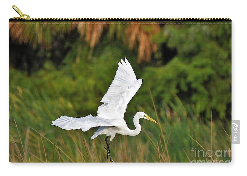 Great White Egret Zip Pouch featuring the photograph White Egret In Flight by Julie Adair