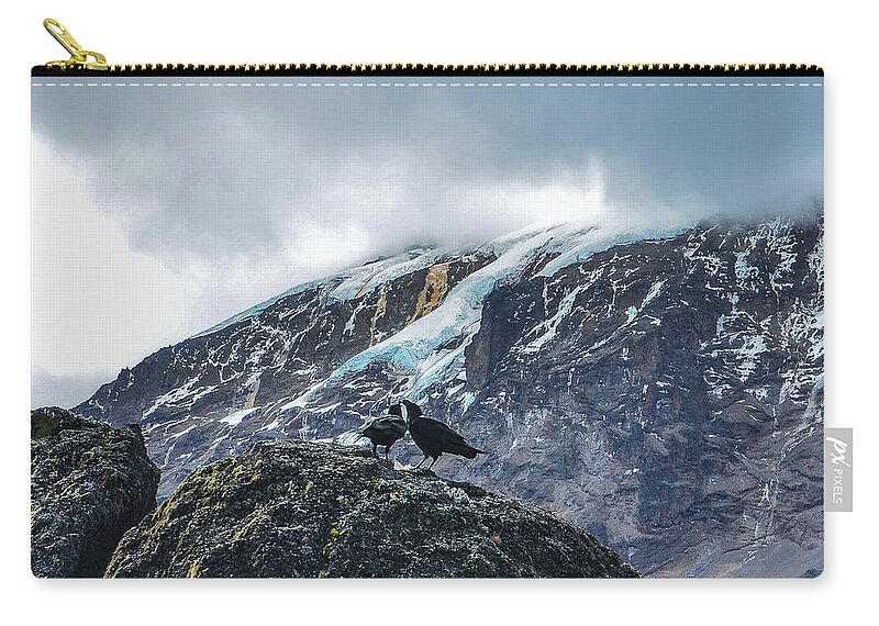 Africa Zip Pouch featuring the photograph White-Necked Raven Pair under Kilimanjaro Summit Glacier by Jeff at JSJ Photography