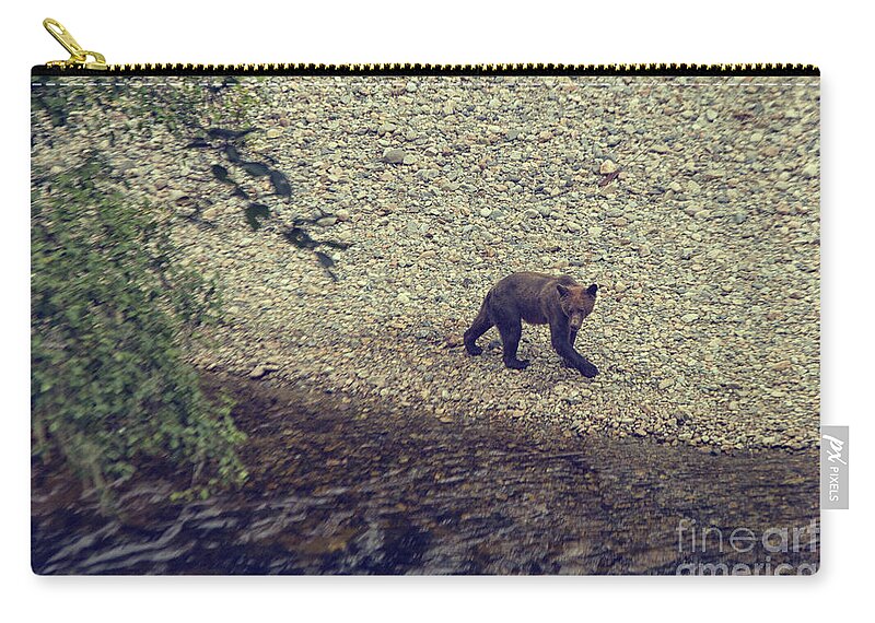 Bear Zip Pouch featuring the photograph Wild Grizzly bear by Patricia Hofmeester