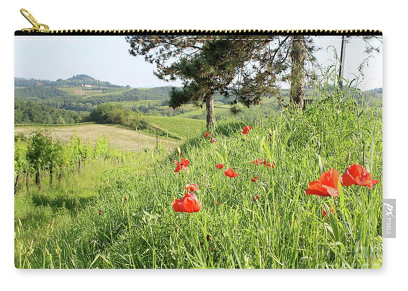 Poppy Zip Pouch featuring the photograph Wild Red Poppies over Italian vineyard and farm in Tuscany by Adam Long