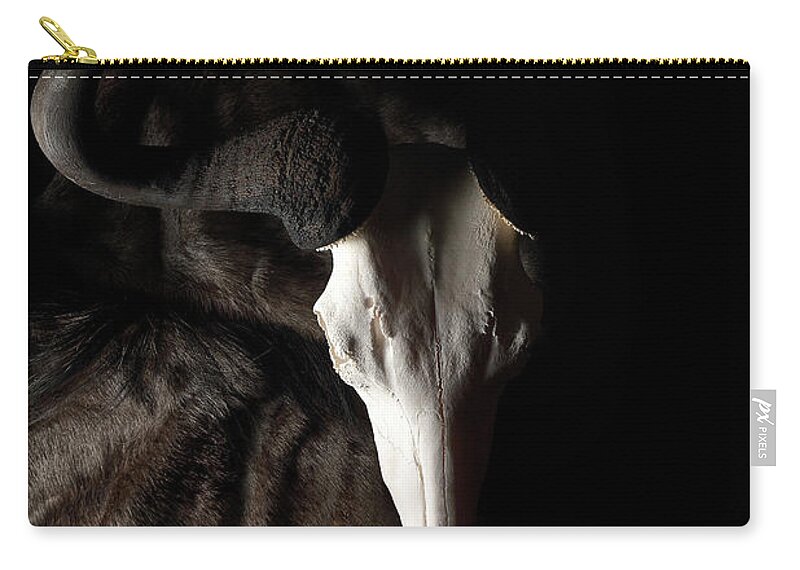 Wildebeest Zip Pouch featuring the photograph Wildebeest Light and Shadow by David Andersen