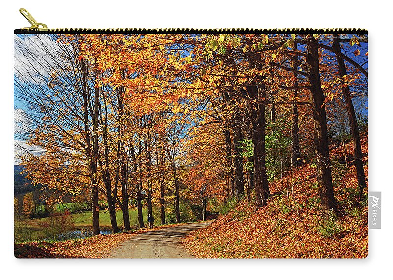 Woodstock Zip Pouch featuring the photograph Winding Country Road in Autumn by James Kirkikis