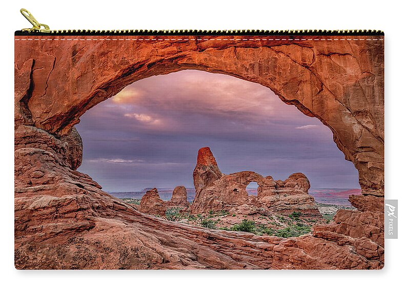 Arches Zip Pouch featuring the photograph Windows at Sunrise by Michael Ash