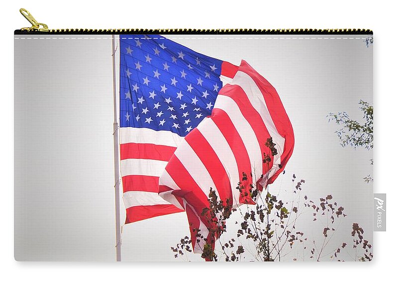 Flag Flying Zip Pouch featuring the photograph Long may it wave by Chuck Brown