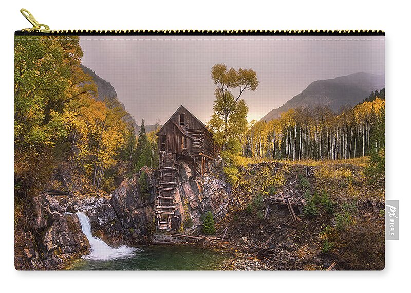 Colorado Zip Pouch featuring the photograph Winter's Coming by Darren White