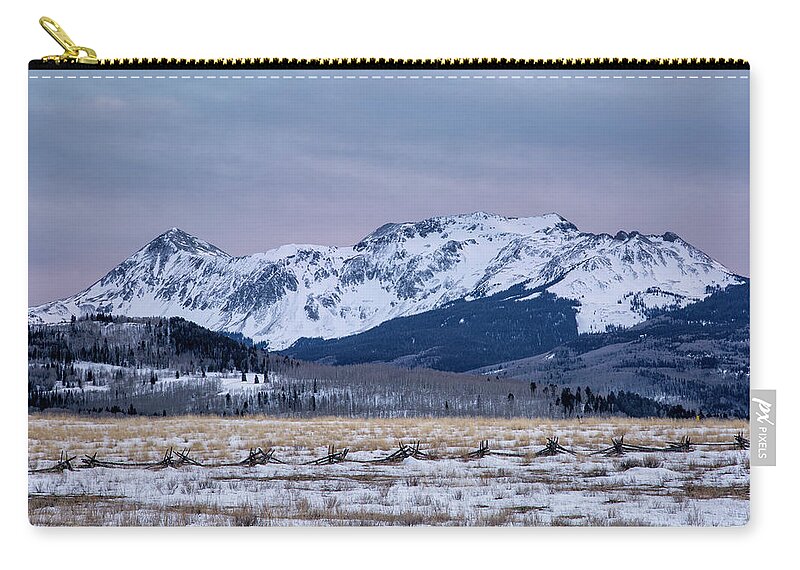 Mountain Zip Pouch featuring the photograph Wintry Mountain After Sunset by Denise Bush