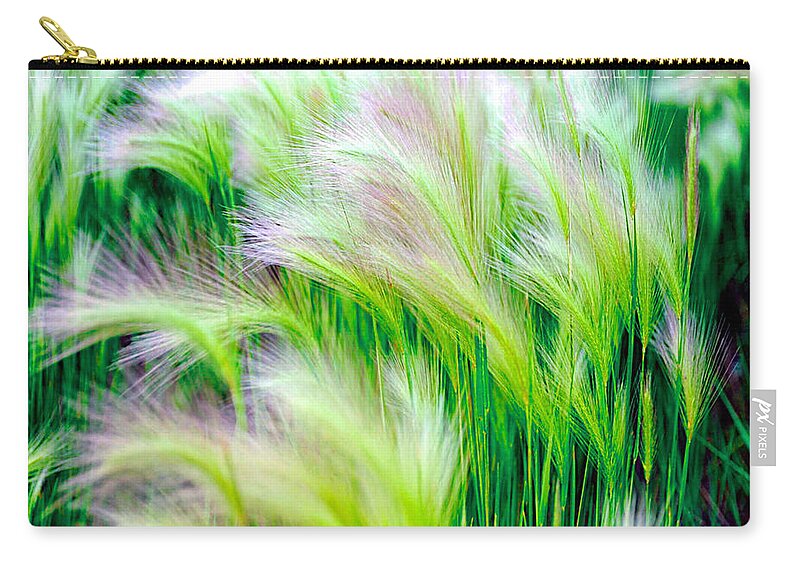 Green Zip Pouch featuring the photograph Wispy Green by Richard Gehlbach