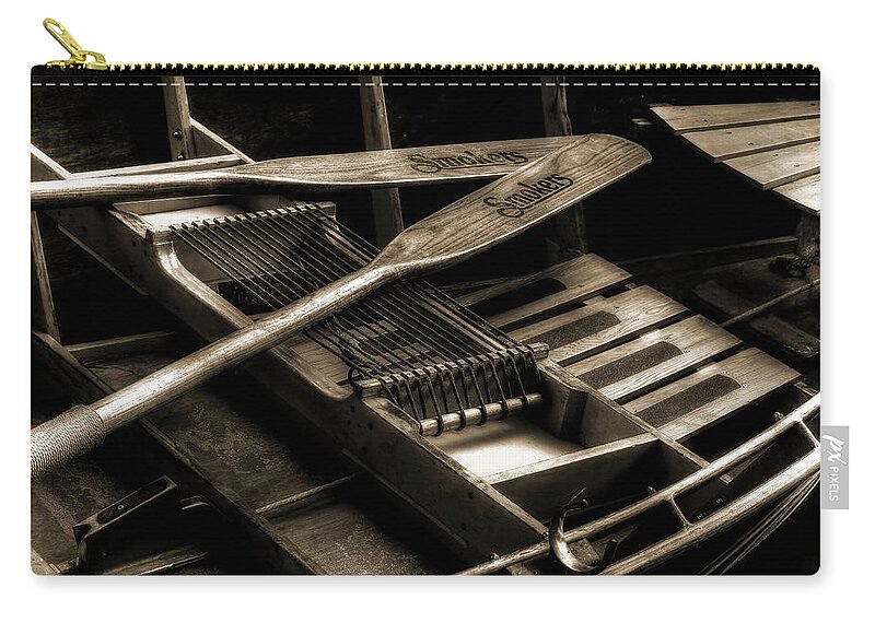 Wooden Rowboat Zip Pouch featuring the photograph Wooden Rowboat And Oars In Tonal Value by Carol Montoya