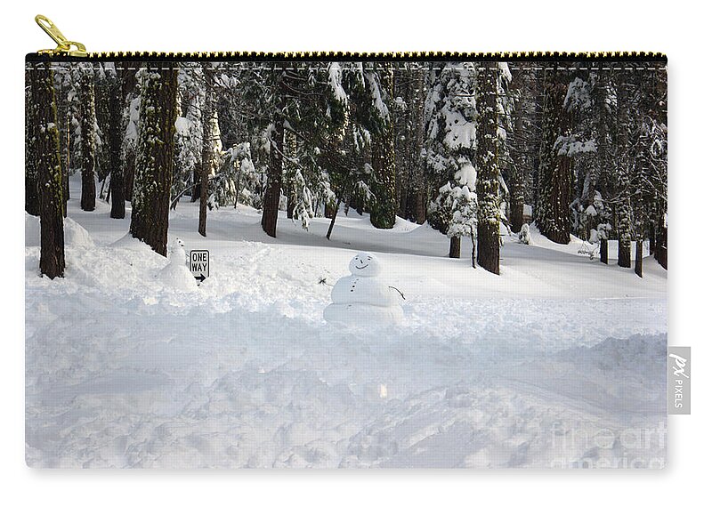 Snowman Zip Pouch featuring the photograph Wrong way snowman by Christine Jepsen