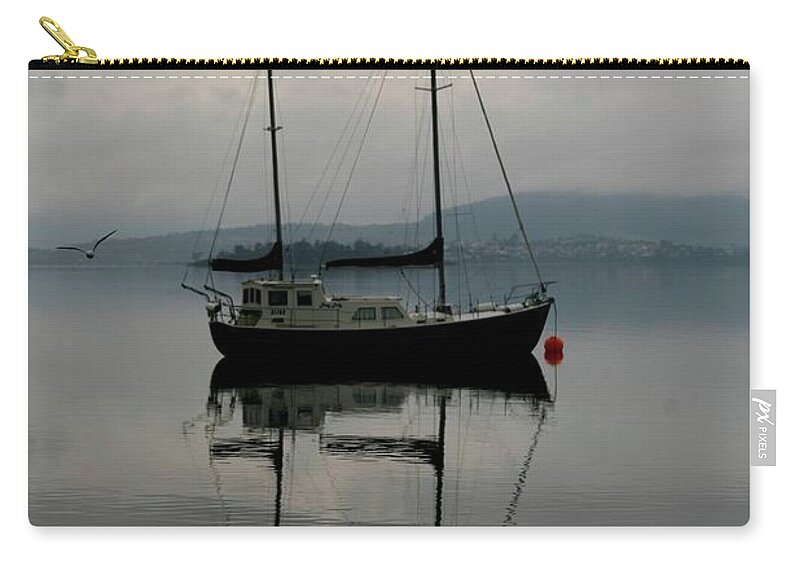 Seascapes Zip Pouch featuring the photograph Yacht At Silent Moorings by Lee Stickels