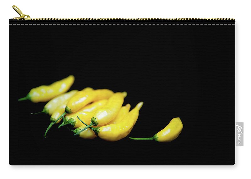 Chilies Zip Pouch featuring the photograph Yellow Chillies on a Black Background by Helen Jackson