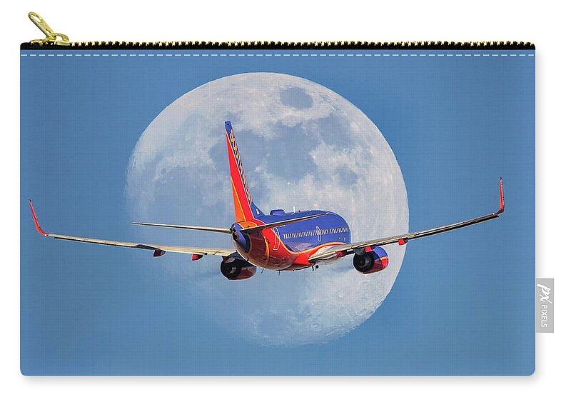 Boeing Zip Pouch featuring the photograph You Are Now Free To Move About The Universe by Jay Beckman