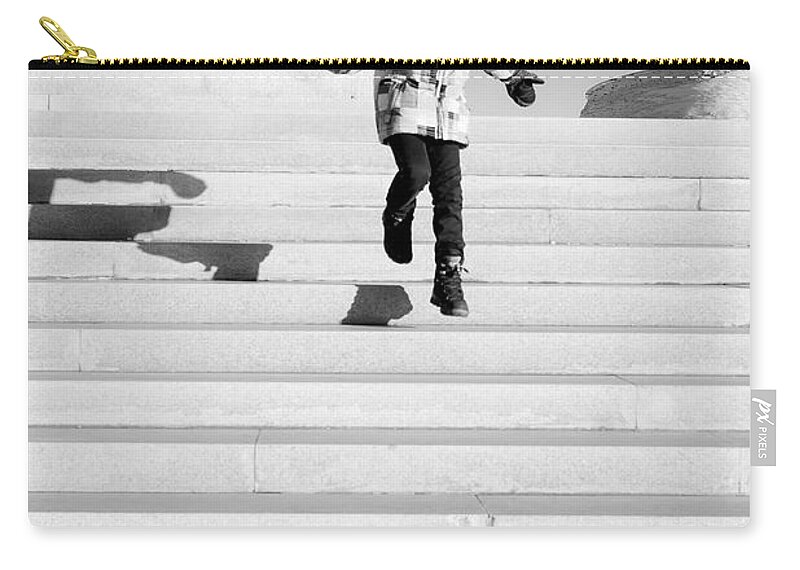Boy Jumping Steps Zip Pouch featuring the photograph Young Child Jumping Down Steps by John Williams